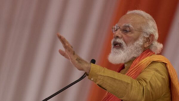 Indian Prime Minister Narendra Modi addresses a gathering during the groundbreaking ceremony of a temple dedicated to the Hindu god Ram, in Ayodhya, India, Wednesday, Aug. 5, 2020 - Sputnik International