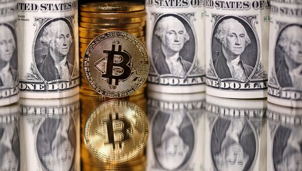 Representations of Bitcoin and U.S. dollar banknotes are seen in this illustration taken January 6, 2020. - Sputnik International