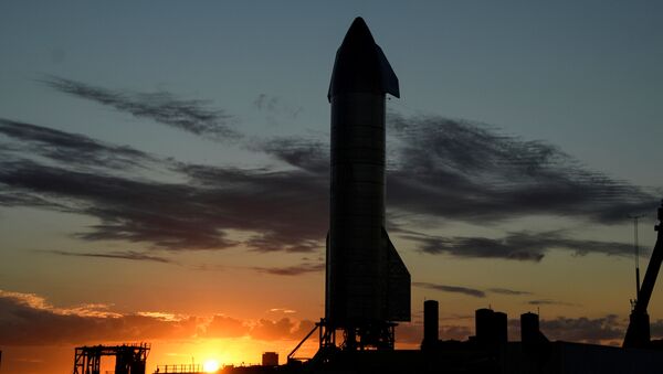 The sun sets as SpaceX prepares their super heavy-lift Starship SN8 rocket  for a test launch this week at the company's facilities in Boca Chica, Texas, US December 1, 2020 - Sputnik International