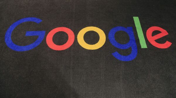 In this Nov. 18, 2019, file photo, the logo of Google is displayed on a carpet at the entrance hall of Google France in Paris. - Sputnik International