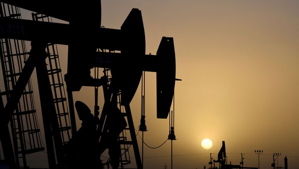 Pump jacks operate at sunset in Midland, Texas, U.S., February 11, 2019. - Sputnik International