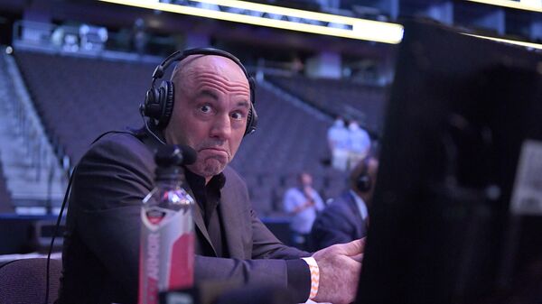 JACKSONVILLE, FLORIDA - MAY 09: Announcer Joe Rogan reacts during UFC 249 at VyStar Veterans Memorial Arena on May 09, 2020 in Jacksonville, Florida. - Sputnik International