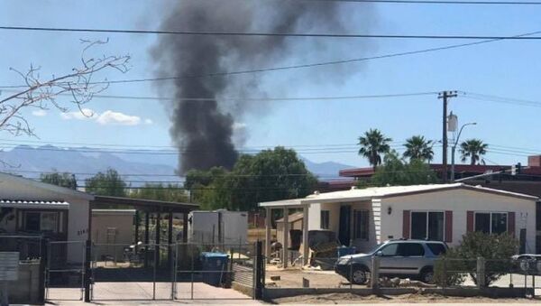 A photo of the downed US military plane near Nellis Air Force Base in Las Vegas, Nevada posted on Twitter. - Sputnik International