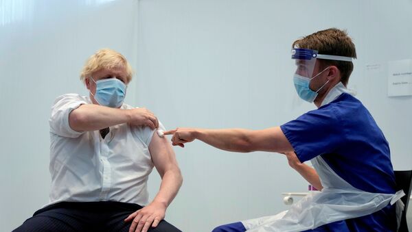 FILE PHOTO: Britain's Prime Minister Johnson receives his second dose of the AstraZeneca coronavirus disease (COVID-19) vaccine, in London - Sputnik International