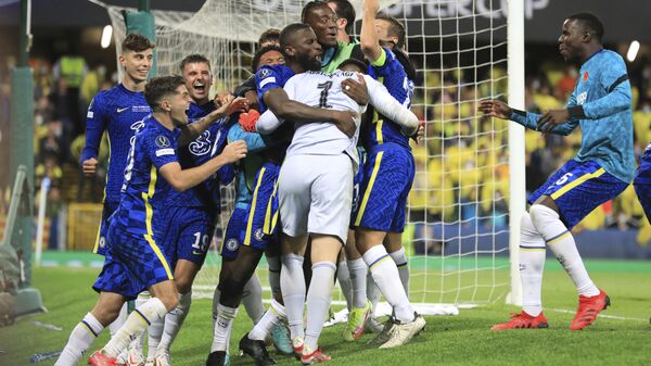 Chelsea's goalkeeper Kepa Arrizabalaga celebrates with team mates after the penalty shootout of the UEFA Super Cup soccer match between Chelsea and Villarreal at Windsor Park in Belfast, Northern Ireland, Wednesday, Aug. 11, 2021 - Sputnik International