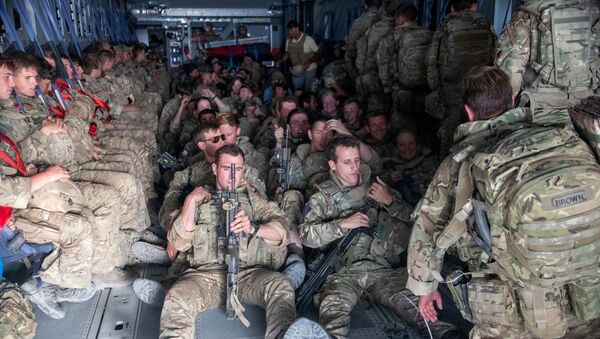 UK military personnel are seen onboard an A400M aircraft departing Kabul, Afghanistan, 28 August 2021. - Sputnik International
