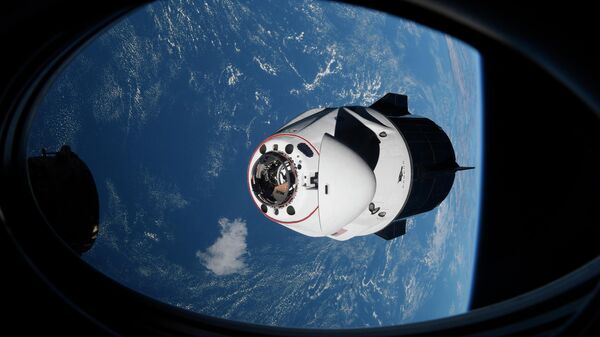 In this Saturday, April 24, 2021, file photo made available by NASA, the SpaceX Crew Dragon capsule approaches the International Space Station for docking. - Sputnik International