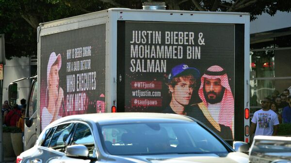 AMobile billboards urging Justin Bieber to cancel his upcoming concert in Saudi Arabia near the Microsoft Theater on November 21, 2021 in Los Angeles, California.  - Sputnik International