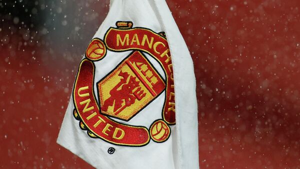 A corner flag with the Manchester United logo on it ahead of the English Premier League soccer match between Manchester United and Manchester City at Old Trafford in Manchester, England. Saturday, Dec. 12, 2020 - Sputnik International