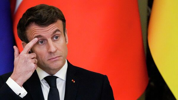 French President Emmanuel Macron gestures while speaking during a joint news conference with Ukrainian President Volodymyr Zelensky following their talks in Kyiv, Ukraine, Tuesday, Feb. 8, 2022 - Sputnik International