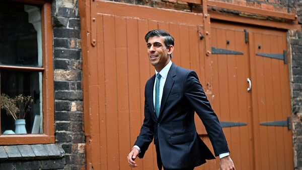 FILE - Britain's Chancellor of the Exchequer Rishi Sunak arrives for a regional cabinet meeting at Middleport Pottery in Stoke on Trent, England, Thursday, May 12, 2022 - Sputnik International