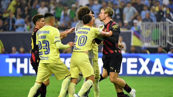 HOUSTON, TEXAS - JULY 20: Jack Grealish of Manchester City clashes with Guillermo Ochoa of Club America during the Pre-Season friendly match between Manchester City and Club America at NRG Stadium on July 20, 2022 in Houston, Texas.  - Sputnik International