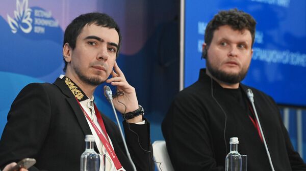 Russian pranksters Vovan (left) and Lexus at the Eastern Economic Forum - Sputnik International
