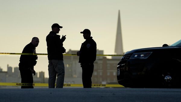 Police stand at the top of the closed street outside the home of Paul Pelosi, the husband of House Speaker Nancy Pelosi, in San Francisco, Friday, Oct. 28, 2022. Paul Pelosi, was attacked and severely beaten by an assailant with a hammer who broke into their San Francisco home early Friday, according to people familiar with the investigation. In the background is the Transamerica Pyramid. - Sputnik International