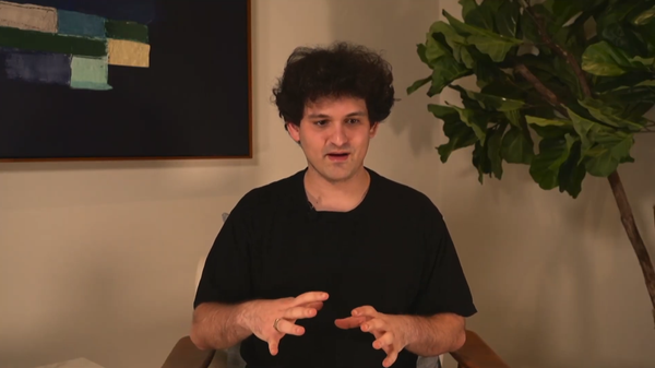 Image capture of FTX owner and founder Sam Bankman-Fried at The New York Times' DealBook Summit where he attempted to explain the multi-billion dollar collapse of the cryptocurrency exchange. - Sputnik International