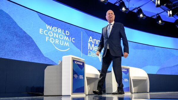 Founder and executive chairman of the World Economic Forum Klaus Schwab arrives on stage during the World Economic Forum (WEF) annual meeting in Davos, on May 25, 2022. File photo. - Sputnik International