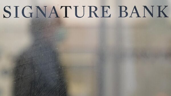 A sign is displayed at a branch of Signature Bank in New York, on March 13, 2023. - Sputnik International