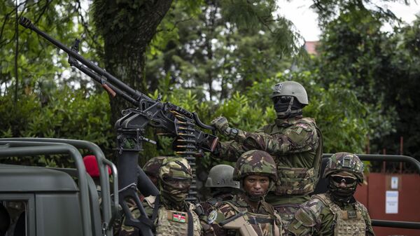 Members of the Kenya Defence Forces (KDF) deployed as part of the East African Community Regional Force (EACRF) ride in a vehicle in Goma, in eastern Congo Wednesday, Nov. 16, 2022.  - Sputnik International