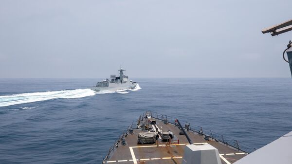The Arleigh Burke-class guided-missile destroyer USS Chung-Hoon (DDG 93) observes PLA(N) LUYANG III DDG 132 (PRC LY 132) execute maneuvers in an unsafe manner while conducting a routine south to north Taiwan Strait transit alongside the Halifax-class frigate HMCS Montreal (FFG 336), June 3. USS Chung-Hoon is on a routine deployment to U.S. 7th Fleet and is assigned to Commander, Task Force (CTF 71)/ Destroyer Squadron (DESRON) 15. CTF 71/DESRON 15 is the largest forward-deployed DESRON and the U.S. 7th Fleet’s principal surface force. - Sputnik International