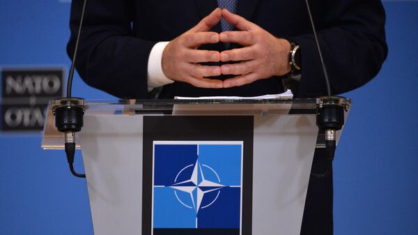 NATO Secretary General Jens Stoltenberg answers questions from journalists after a meeting of the NATO-Russia Council in Brussels. - Sputnik International