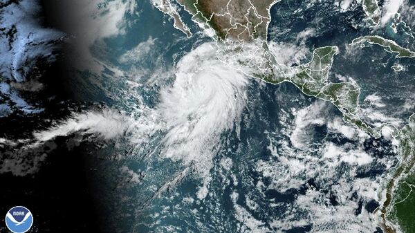 This satellite image taken at 10:50am EDT on Thursday, Aug. 17, 2023, and provided by the National Oceanic and Atmospheric Administration (NOAA) shows Hurricane Hilary off the Pacific coast of Mexico. - Sputnik International