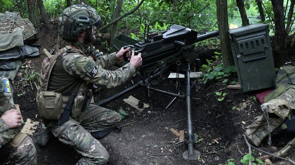 Ukrainian soldiers in a dugout - Sputnik International