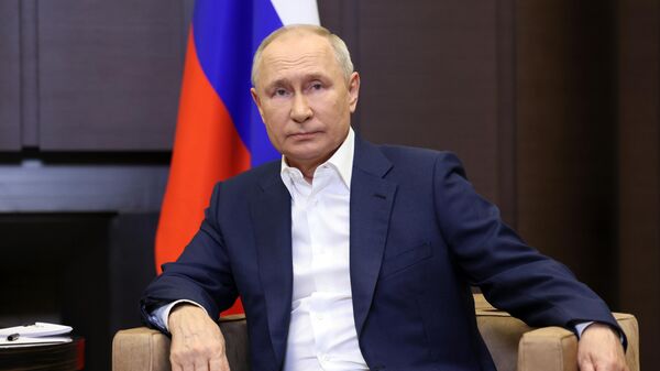 Russia's President Vladimir Putin attends a meeting with Belarus' President Alexander Lukashenko, in Sochi, Russia. - Sputnik International