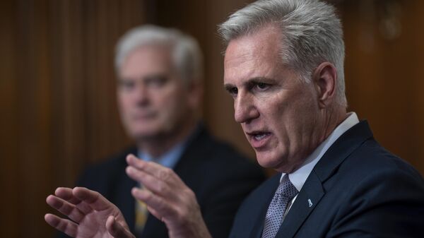 Speaker of the House Kevin McCarthy, R-Calif., joined by Majority Whip Tom Emmer, R-Minn., holds a news conference just after the House approved a 45-day funding bill to keep federal agencies open, but the measure must first go to the Senate, at the Capitol in Washington, Saturday, Sept. 30, 2023. - Sputnik International