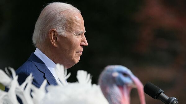 US President Joe Biden pardons the national Thanksgiving turkey, Liberty, during a pardoning ceremony at the White House in Washington, DC on November 20, 2023.  - Sputnik International