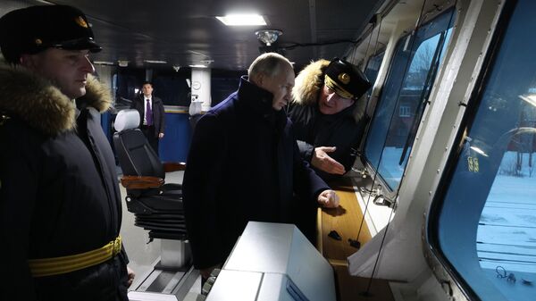 Russian President Vladimir Putin pays a visit to Severodvinsk, northern Russia to inspect new Russian warships and submarines armed with hypersonic weaponry. December 11, 2023. Speaking to Putin is Admiral Nikolai Yevmenov, Commander-in-Chief of the Russian Navy. - Sputnik International