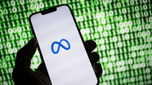This illustration photograph taken on October 30, 2023, shows the Meta (former Facebook) logo on a smartphone in Mulhouse, eastern France.  - Sputnik International
