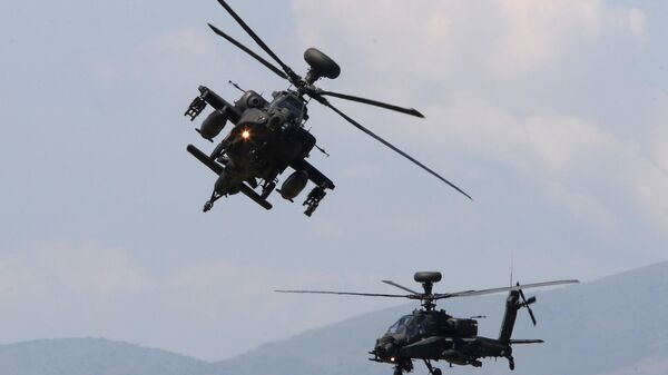 British Apache helicopters participate in the Swift Response 22 military exercise at the Krivolak army training polygon in the central part of North Macedonia, on Thursday, May 12, 2022.  - Sputnik International