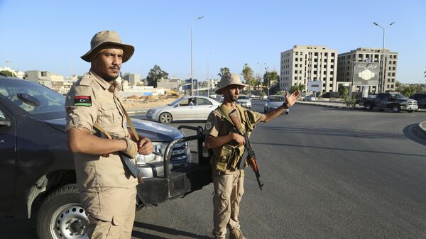Libyan security forces stand guard in Tripoli, Libya, Tuesday, Aug. 16, 2023 - Sputnik International