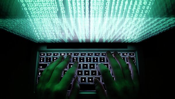 A man types on a computer keyboard - Sputnik International