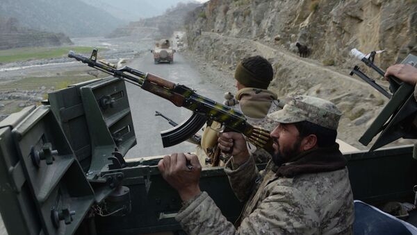  Afghan security personnel patrol during an ongoing anti-Taliban operation in Dangam district near the Pakistan-Afghanistan border in the eastern Kunar province - Sputnik International