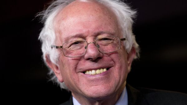 Sen. Bernie Sanders, I-Vt., smiles as he is asked about running for president during a news conference on Capitol Hill in Washington, Wednesday - Sputnik International