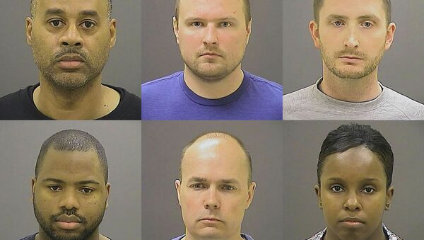 These undated photos provided by the Baltimore Police Department, show Baltimore police officers, top row from left, Caesar R. Goodson Jr., Garrett E. Miller and Edward M. Nero, and bottom row from left, William G. Porter, Brian W. Rice and Alicia D. White, charged with felonies ranging from assault to murder in the police-custody death of Freddie Gray. A grand jury indicted the six officers, State's Attorney Marilyn Mosby said Thursday, May 21, 2015. - Sputnik International