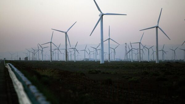 Wind turbines produced by Goldwind Science & Technology Ltd. are seen at the Da Bancheng Wind Farm, south of Urumqi, in Xinjiang, China - Sputnik International