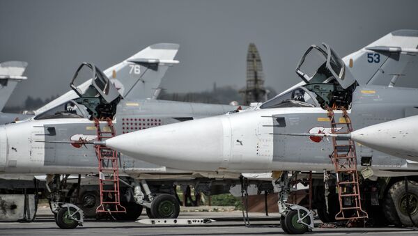 Russian Su-24 tactical bombers at the Hmeimim airbase in the Latakia Governorate of Syria - Sputnik International