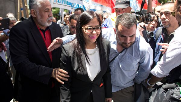 Venezuela's Foreign Minister Delcy Rodriguez (C) leaves Argentina's Foreign Ministry at San Martin palace, where the Mercosur summit was being held, in Buenos Aires, Argentina, December 14, 2016. - Sputnik International