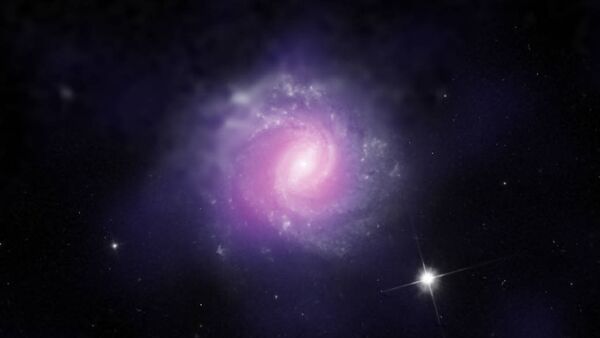 IC 3639, a galaxy with an active galactic nucleus, is seen in this image combining data from the Hubble Space Telescope and the European Southern Observatory. - Sputnik International
