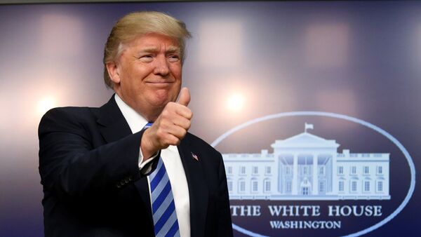 U.S. President Donald Trump gives a thumbs up as he hosts a CEO town hall on the American business climate at the Eisenhower Executive Office Building in Washington, U.S., April 4, 2017 - Sputnik International