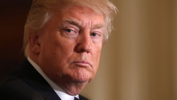 President Donald Trump listens during a news conference with NATO Secretary General Jens Stoltenberg in the East Room of the White House in Washington, Wednesday, April 12, 2017. - Sputnik International