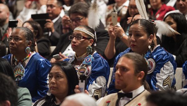 People listen as US President Barack Obama speaks during a panel discussion during the 2015 White House Tribal Nations Conference at the Ronald Reagan Building and International Trade Center in Washington, DC, November 5, 2015. - Sputnik International