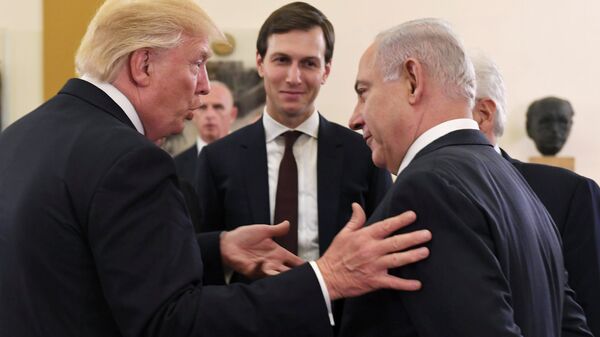 Israel's Prime Minister Benjamin Netanyahu and U.S. President Donald Trump chat as White House senior advisor Jared Kushner is seen in between them, during their meeting at the King David hotel in Jerusalem May 22, 2017 - Sputnik International