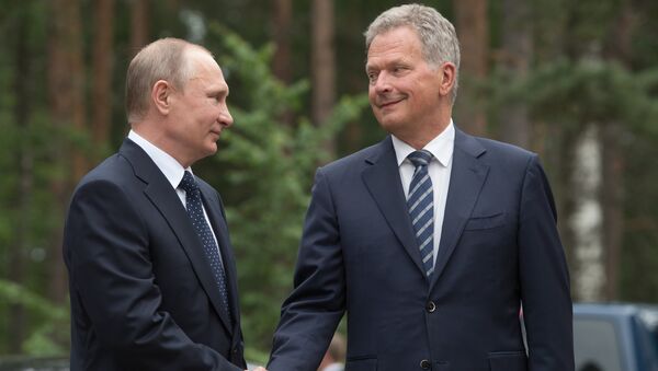 Russian President Vladimir Putin and President of Finland Sauli Niinisto, right, during their meeting - Sputnik International