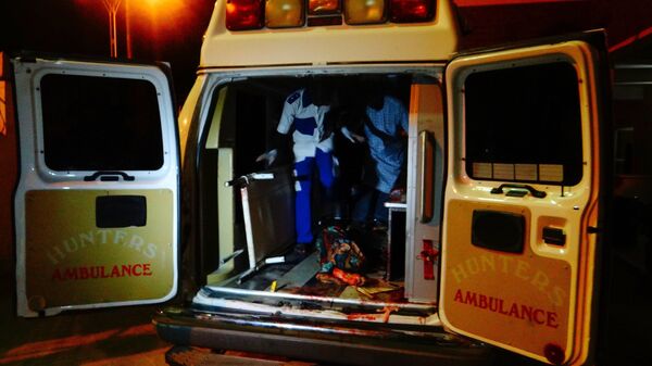 An injured victim of a female suicide bomber arrives in an ambulance for medical attention at a Maiduguri hospital in northeast Nigeria on August 15, 2017 - Sputnik International