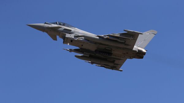 In this Thursday, Sept. 22, 2016, a Typhoon aircraft takes off from RAF, Akrotiri, Cyprus. British air forces for a mission in Iraq. British Tornado and Typhoon aircraft stationed at a U.K. air base in Cyprus are pounding Islamic State targets - Sputnik International