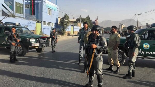 Afghan security police stand guard near the site of a deadly suicide attack outside a cricket stadium, in Kabul, Afghanistan. - Sputnik International