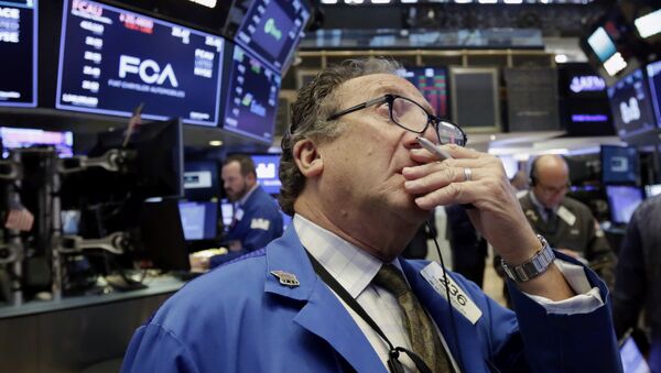 Trader Steven Kaplan works on the floor of the New York Stock Exchange, Tuesday, June 19, 2018. U.S. stock markets are opening sharply lower Tuesday as tensions over trade between the U.S. and China seem closer to a boil - Sputnik International